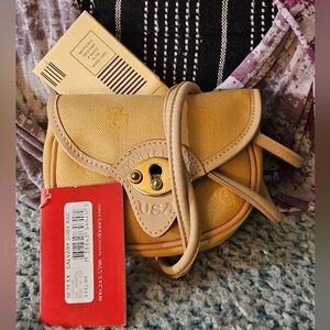 Dooney & Bourke Signature Yellow Crossbody/Belt Bag.